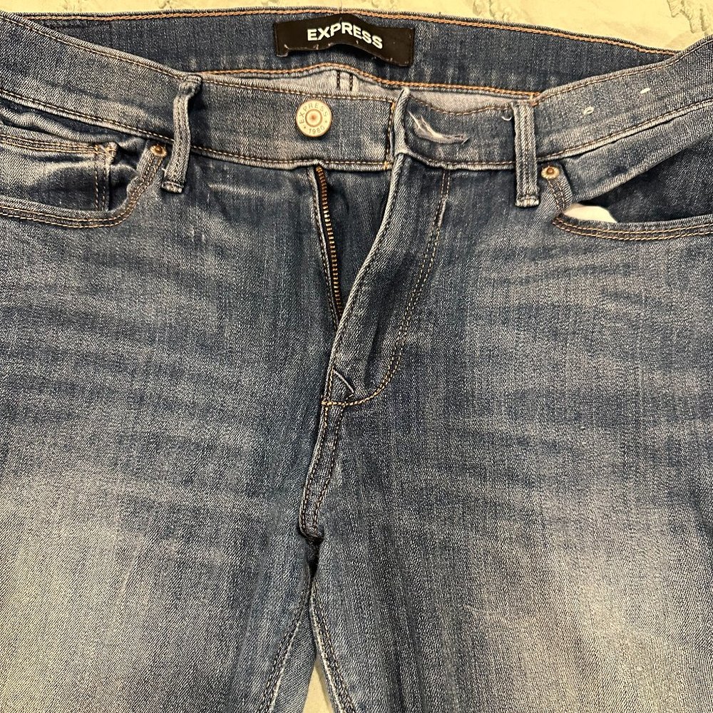 Express Mid Rise Legging Stretch Medium Wash Jeans